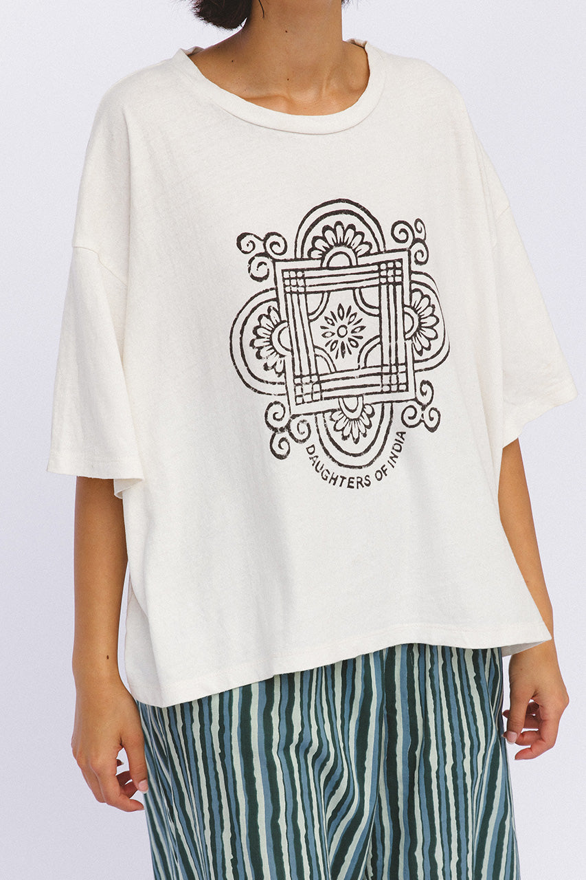 Shanti Tee White — close-up front view of mandala logo print detail on white oversized cotton tee, hand screen printed in India | Daughters of India