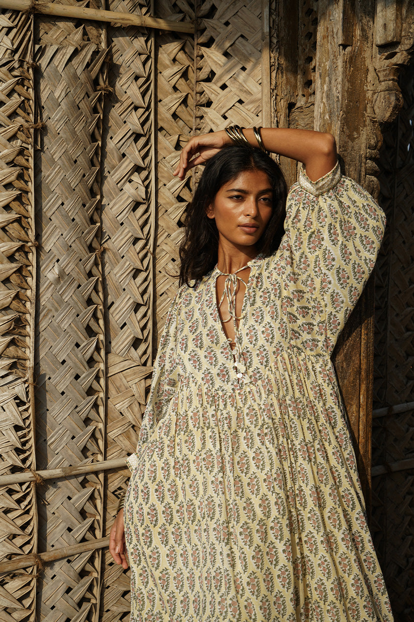 Bhoomi Maxi Dress Meadow — neckline tie detail against bamboo wall, artisan hand block print cotton | Daughters of India