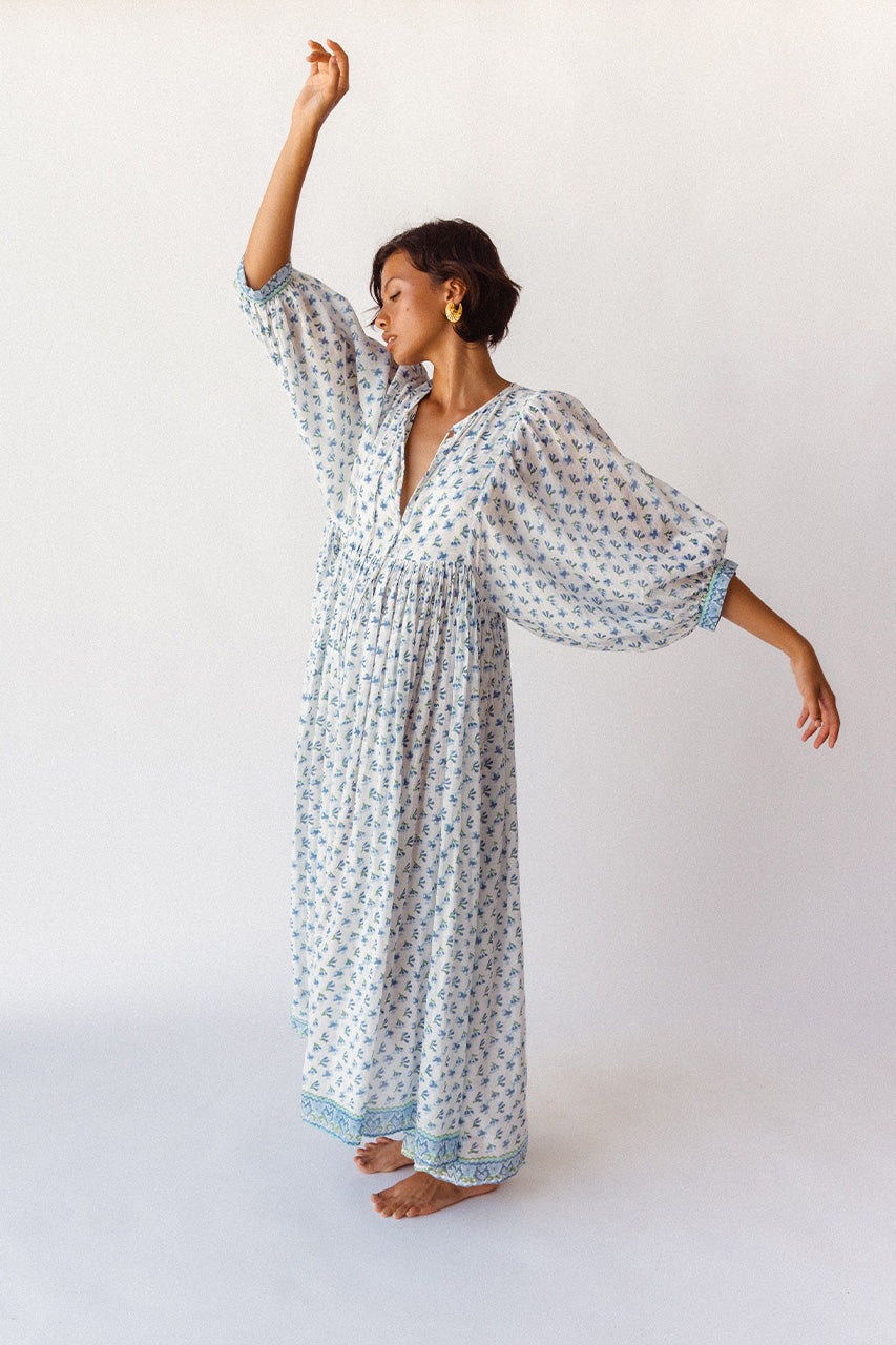 Daughters of India Kyra Maxi Dress in Azure — studio arms spread showing billowed sleeves, block print cotton maxi