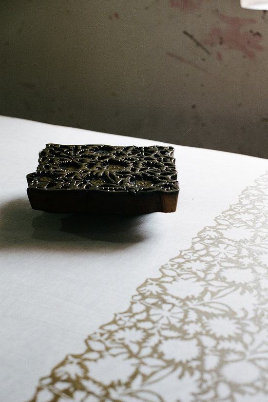 Daughters of India — carved wooden block and hand block printed olive floral cotton fabric in workshop