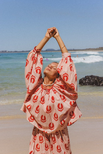 Ria Blouse Cherry Blossom — studio full length front view, model wearing cherry blossom pink hand block print cotton blouse, relaxed tie-front style, artisan Jaipur India | Daughters of India